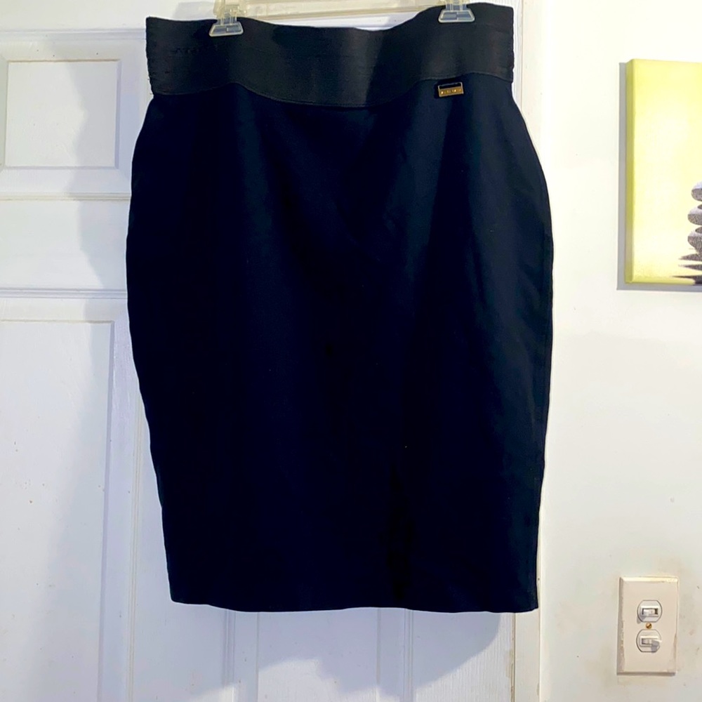 Beautiful soft knee length form fitted pencil skirt with wide band waist